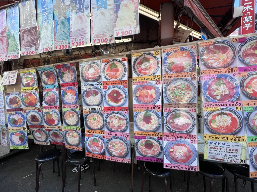 Street restaurant menus featuring fresh tuna donburi and seafood bowls at  Ameyoko market