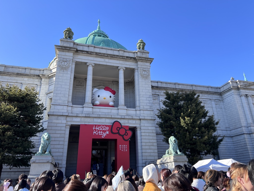 Hello Kitty exhibition entrance with large character display at Tokyo National Museum in Ueno Park.