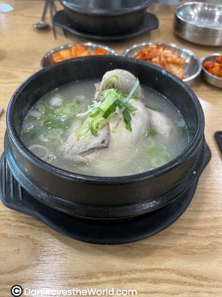 Baengnyeon Samgyetang. Korean whole chicken soup in a cast iron skillet