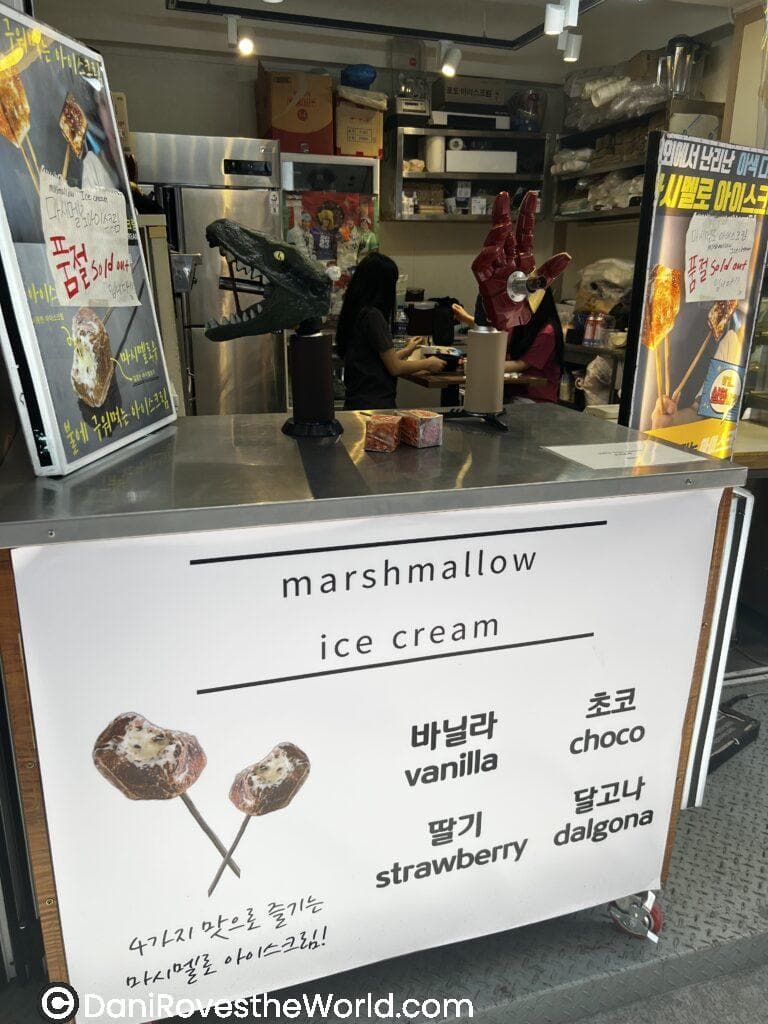 Marshmallow ice cream stand in Hongdae, Seoul, offering flavors like vanilla, chocolate, and dalgona, a fun and unique treat for solo female travelers to try while exploring the area