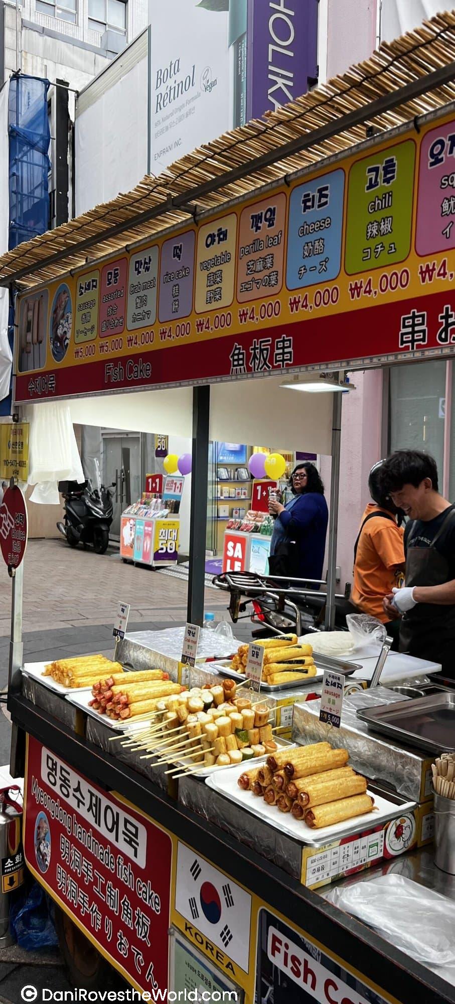 Food stand at one of the markets in Seoul. You can avoid getting rained on while visiting these food markets if you know how to avoid the worst time to visit seoul
