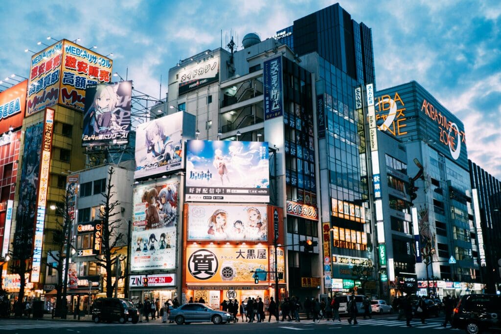 Evening view of Akihabara’s glowing billboards and anime shops, a vibrant neighborhood for where to stay in Tokyo.