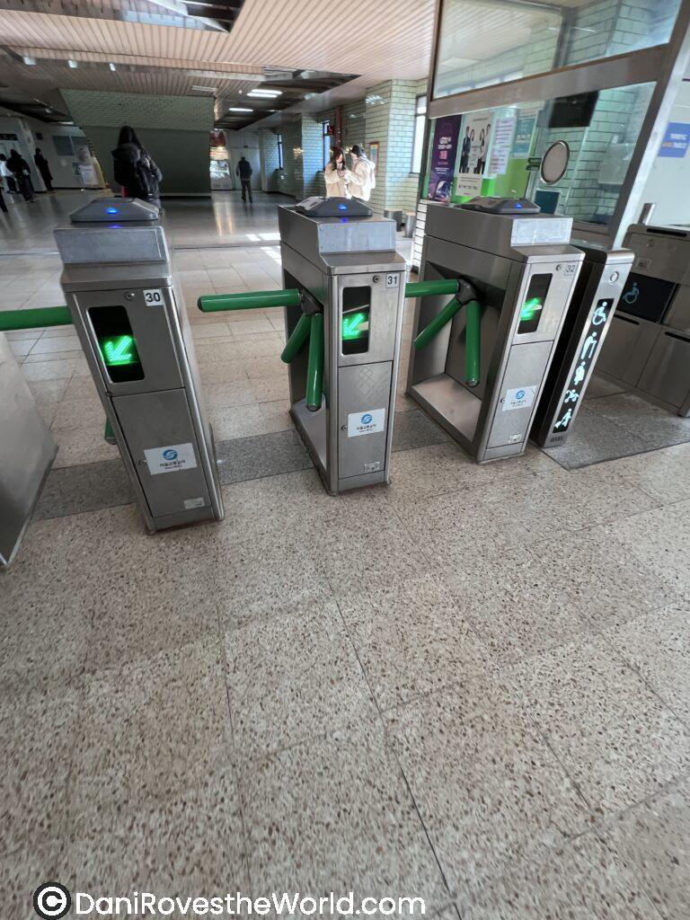 Turnstiles at subway station
Three subway turnstiles with green lights at a Seoul Metro station, indicating access is granted. These automated gates are commonly used when navigating Seoul’s subway system as a solo traveler.